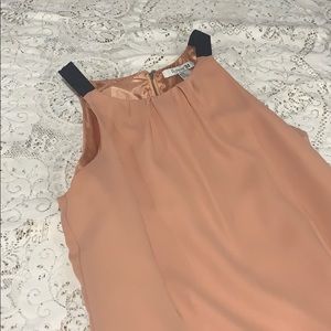 Blush colored night out dress with black outlines